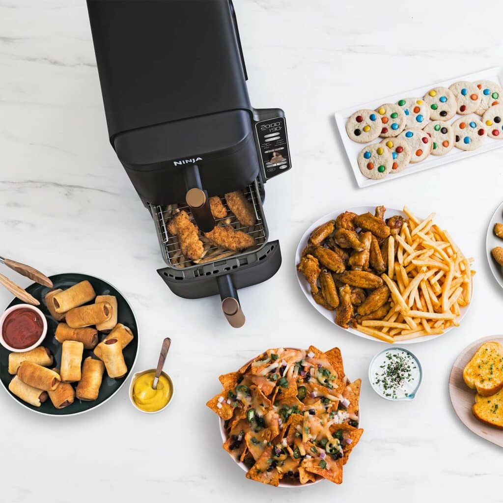 Gros plan sur le panneau de commande du Ninja Double Stack XL SL400EU affichant les six modes de cuisson : Air Fry, Max Crisp, Roast, Bake, Reheat et Dehydrate.