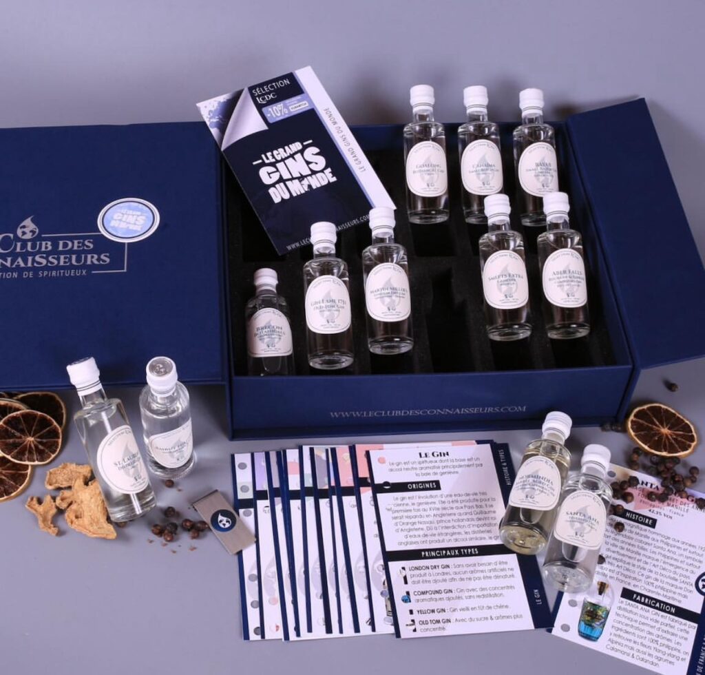 Coffret de box alcool avec bouteilles et petits flacons de dégustation pour illustrer les options ponctuelles ou avec abonnement dans l’univers du vin des bières artisanales et des spiritueux et aider le lecteur à comprendre la flexibilité de ces box.