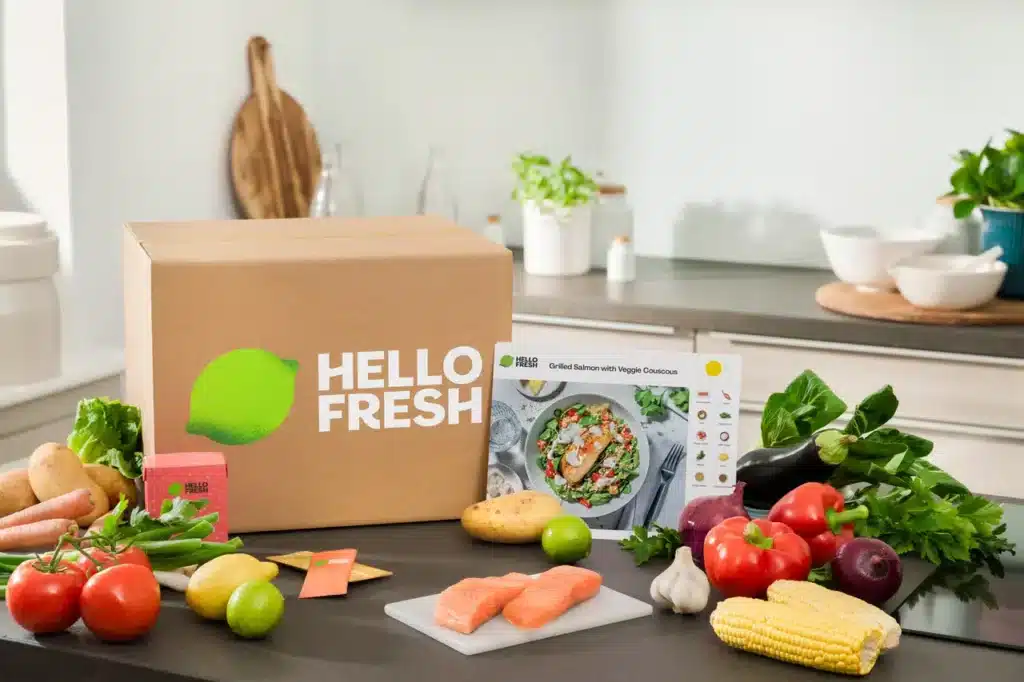 Box repas contenant légumes ingrédients portionnés et fiche recette pour montrer comment les box cuisine avec ou sans abonnement simplifient les repas de la semaine et s’adaptent aux besoins des personnes qui cherchent des solutions flexibles.
