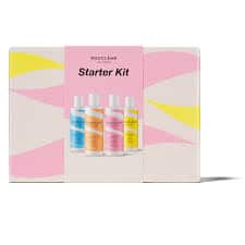 Gros plan d’une chevelure bouclée brillante et définie après usage des produits Bouclème, illustrant un avis personnel et sincère sur la marque naturelle pour cheveux bouclés.