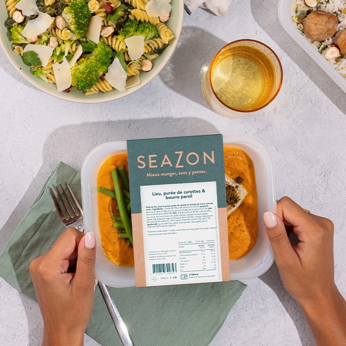 Photo de plats préparés Seazon présentés dans des barquettes recyclables, avec légumes colorés et viande tendre prêts à réchauffer.
