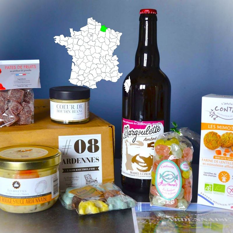 Photo d’un coffret mensuel La Gourmet Box avec bouteille de vin et spécialités régionales pour illustrer le fonctionnement de l’abonnement.