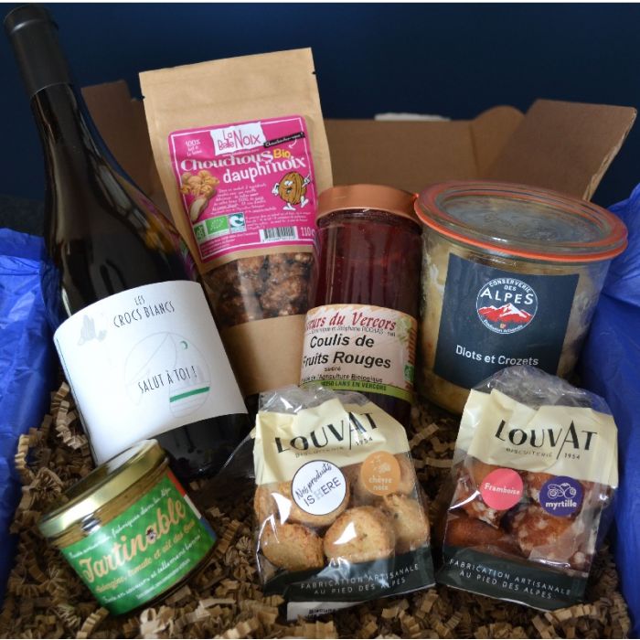 Montage représentant des avis clients positifs autour d’un coffret gourmand pour illustrer la réputation de La Gourmet Box.