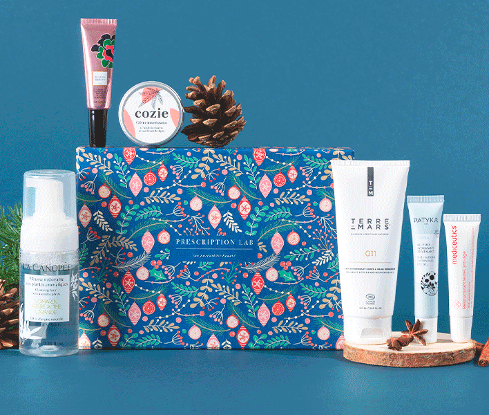 Image mettant en avant l’approche premium de Prescription Lab avec un produit de la marque posé à côté de marques partenaires renommées pour illustrer la sélection haut de gamme et le magazine Le Prescripteur.