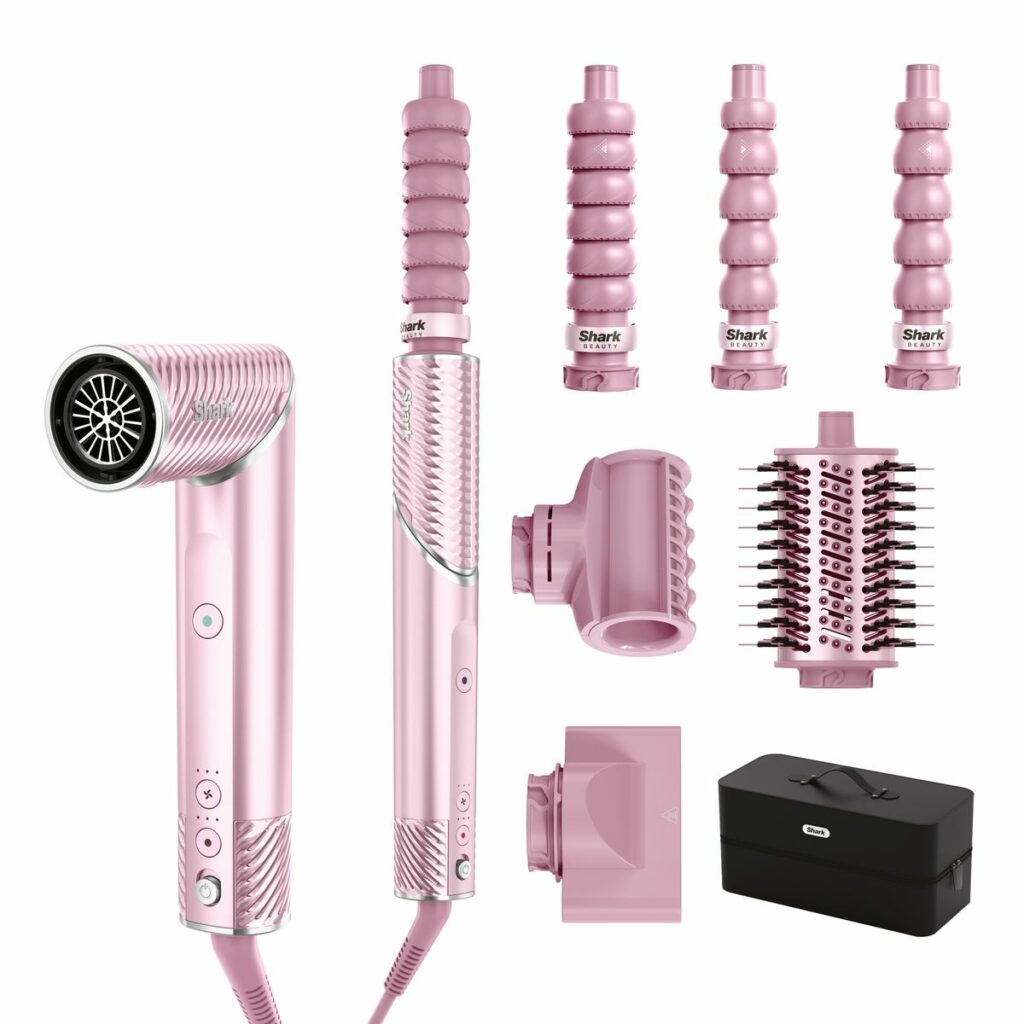 photo de tous les accessoires de l’IonCurl étalés , boucleurs, brosse ovale, concentrateur et étui, pour illustrer le guide